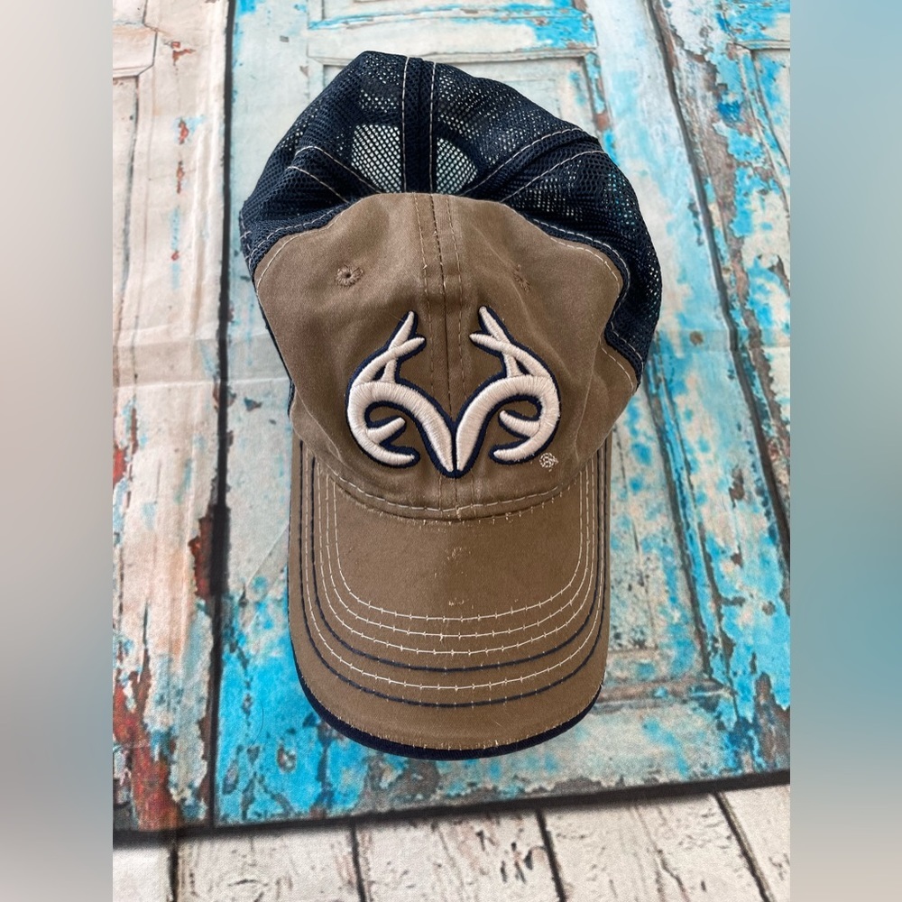 Navy blue and brown hat by Realtree